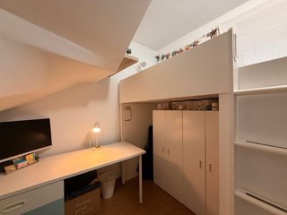 Habitación juvenil cama alta