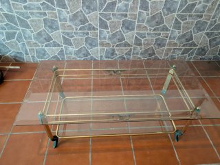 Mesa de centro cristal y metal dorado