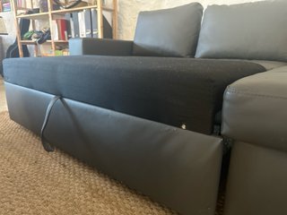 Sofá cama de polipiel gris