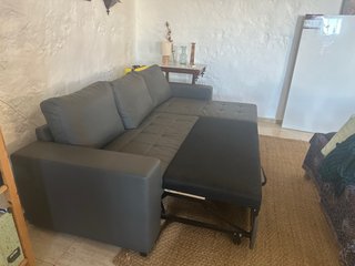 Sofá cama de polipiel gris