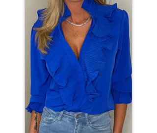 Camisa azul con volantes