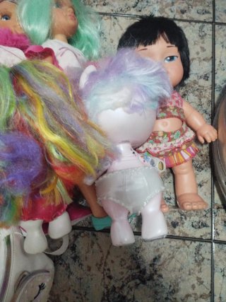Dos muñecos Poopsie Unicornio