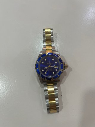 Reloj Rolex bicolor azul y dorado