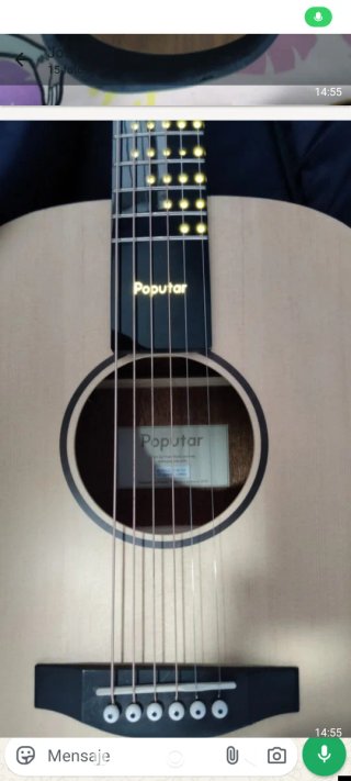 Guitarra acústica con marcadores