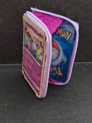 Monedero Pokémon Grumpig con Carta Encapsulada