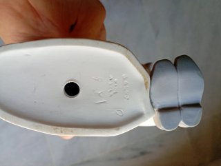 Figura porcelana niña con zapatos