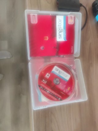 SingStar PS3 con micros y adaptador