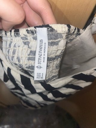 Top Stradivarius estampado cebra
