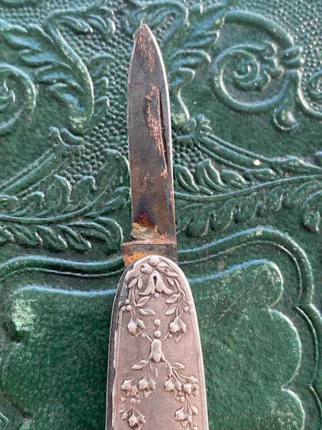 Preciosa navaja antigua plata labrada