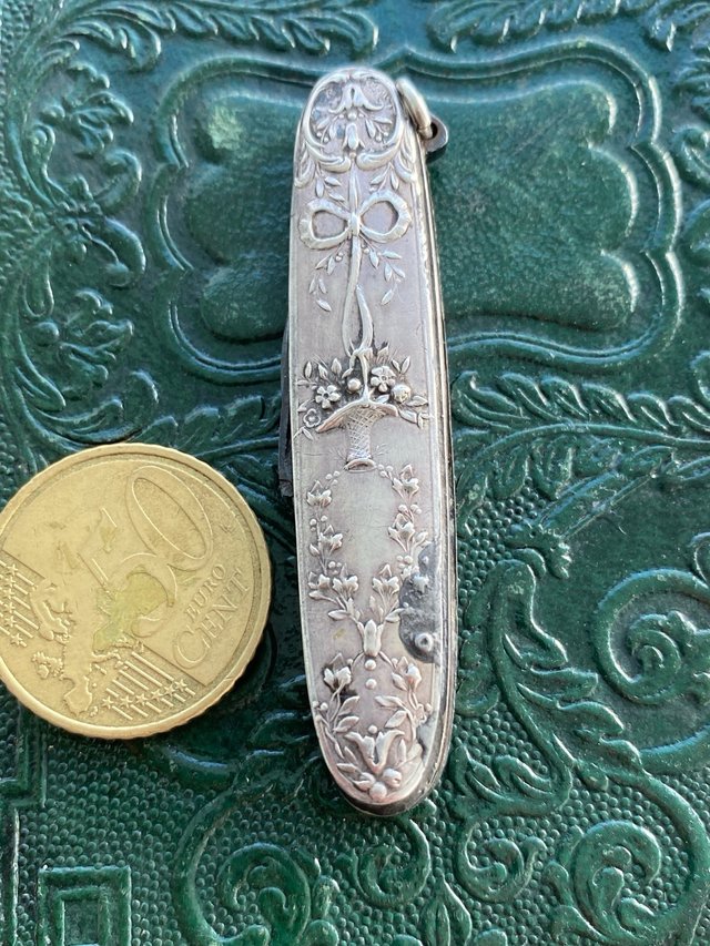 Preciosa navaja antigua plata labrada