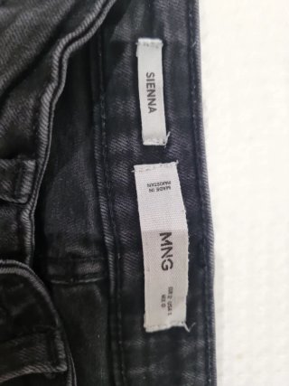 Vaqueros Mango campana negros Talla XS