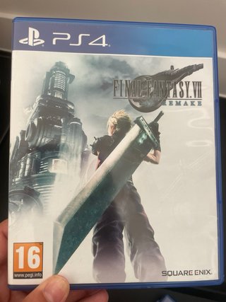 PS4 (PlayStation 4) con 2 mandos y juegos