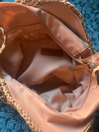 Bolso redondo de rafia