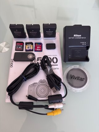 Nikon D5100 + 2 objetivos + extras (9.125 disp.)