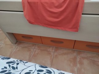 Cama nido blanca con 4 cajones naranja