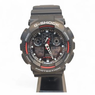 RELOJ CASIO G SHOCK GA 100 ESFERA NEGRA/CORREA GOMA + CAJA