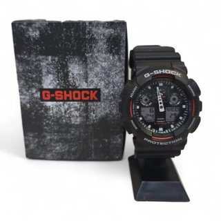 RELOJ CASIO G SHOCK GA 100 ESFERA NEGRA/CORREA GOMA + CAJA
