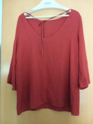 Blusa roja manga tres cuartos