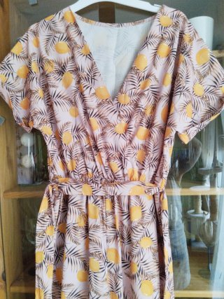 Mono estampado amarillo/ naranja y beige