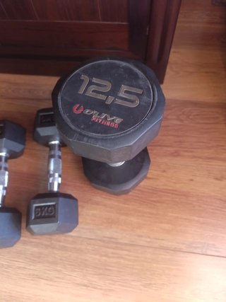2 mancuernas de 12.5 kg  y 2 mancuernas de 6 kg