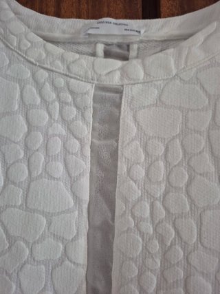 Blusa Zara blanca sin mangas texturizada