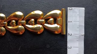 Brazalete ZRC chapado en oro eslabones corazón