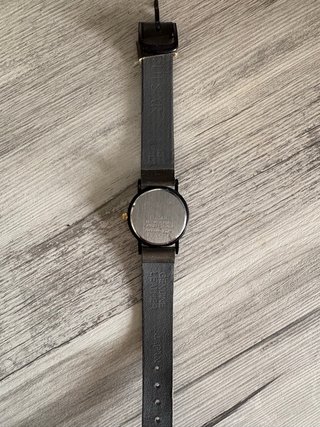 Reloj Pulsar Negro y Dorado