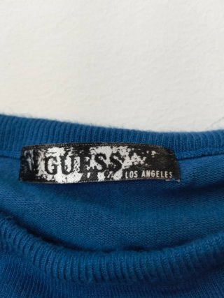 Top Guess Azul de punto palabra de honor