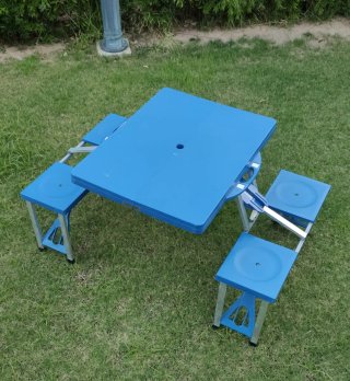 Mesa plegable con sillas camping playa
