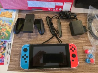 Nintendo Switch + juego y asesorios . Muy poco uso