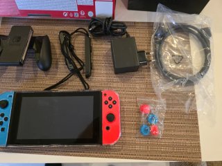 Nintendo Switch + juego y asesorios . Muy poco uso