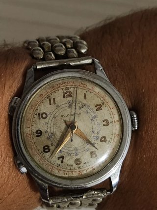 Reloj Rulo Watch Beige y Plateado funcionando