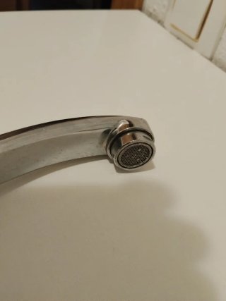 Grifo de cocina agua fría y caliente con latiguill