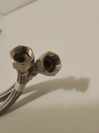 Grifo de cocina agua fría y caliente con latiguill