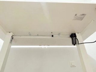 Escritorio elevable eléctrico con puertos de carga