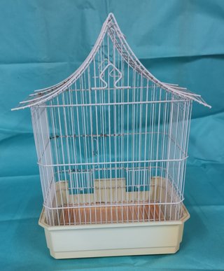 Jaula para pájaros con accesorios