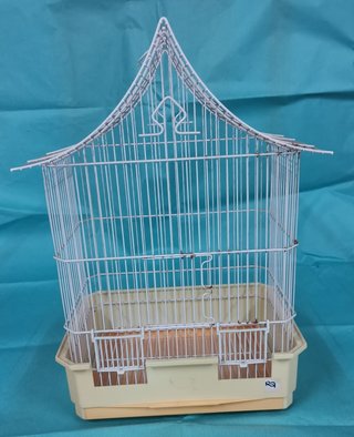 Jaula para pájaros con accesorios