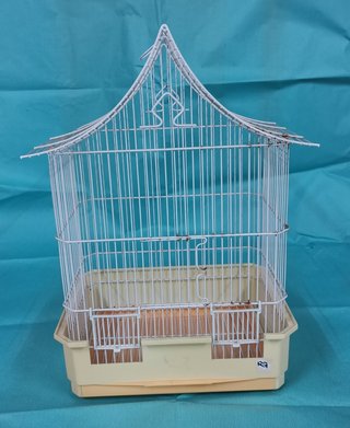 Jaula para pájaros con accesorios