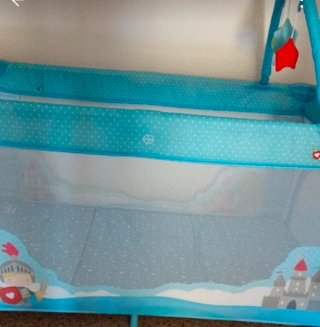 Cuna de viaje con estampado infantil