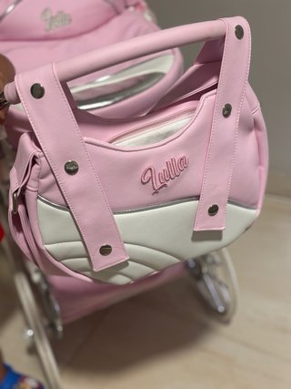 Carrito de muñecas rosa y blanco