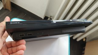 PlayStation 3 Slim + 11 Giochi PS3