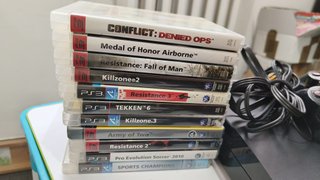 PlayStation 3 Slim + 11 Giochi PS3