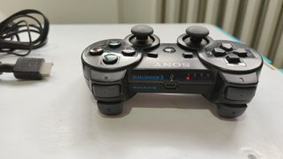 PlayStation 3 Slim + 11 Giochi PS3
