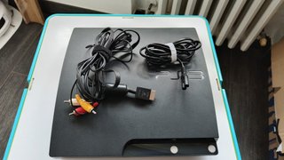 PlayStation 3 Slim + 11 Giochi PS3