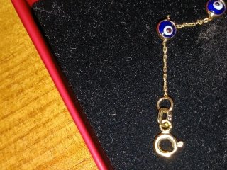 Pulsera  de Oro,18 kt.,con ojos turcos.