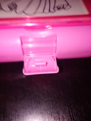 Proyector de muñecas rosa