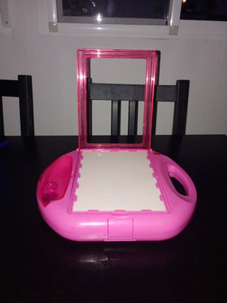 Proyector de muñecas rosa