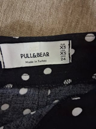 Minifalda lunares negra