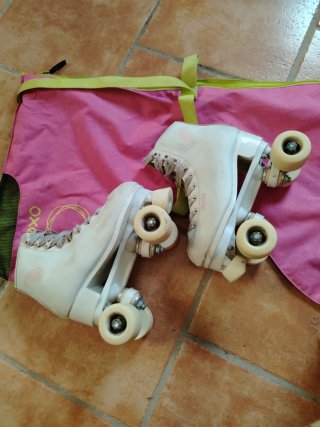 Patines Oxelo 4 ruedas + Bolsa (talla 35-22,5 cm)