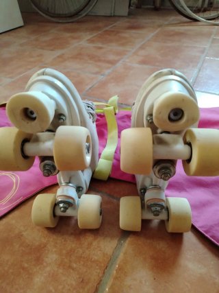 Patines Oxelo 4 ruedas + Bolsa (talla 35-22,5 cm)